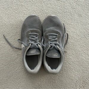 Well worn ladies sneakers